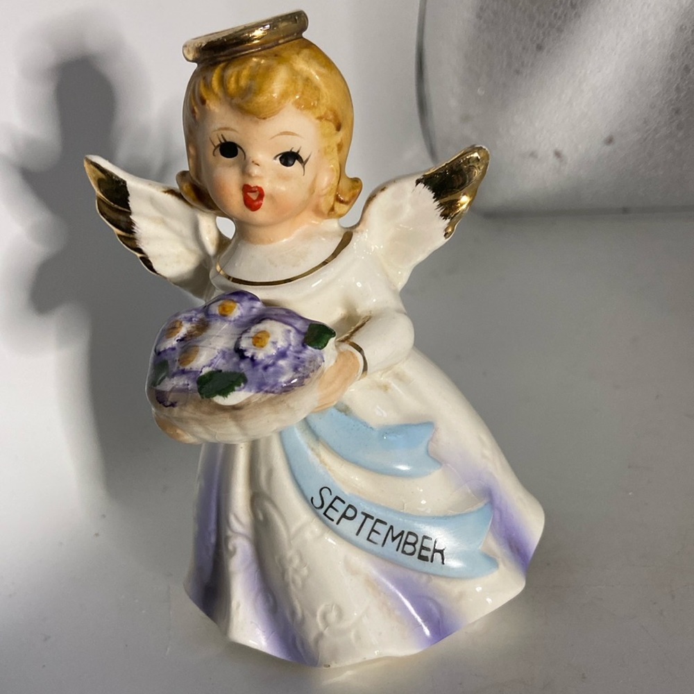 Angel. September.  Made in Japan. 5” tall 2.5” wide Porcelain white & blue& gold